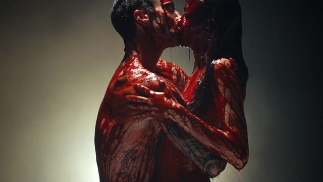 Adam Levine and Behati Prinsloo Get Bloody for Maroon 5's "Animals