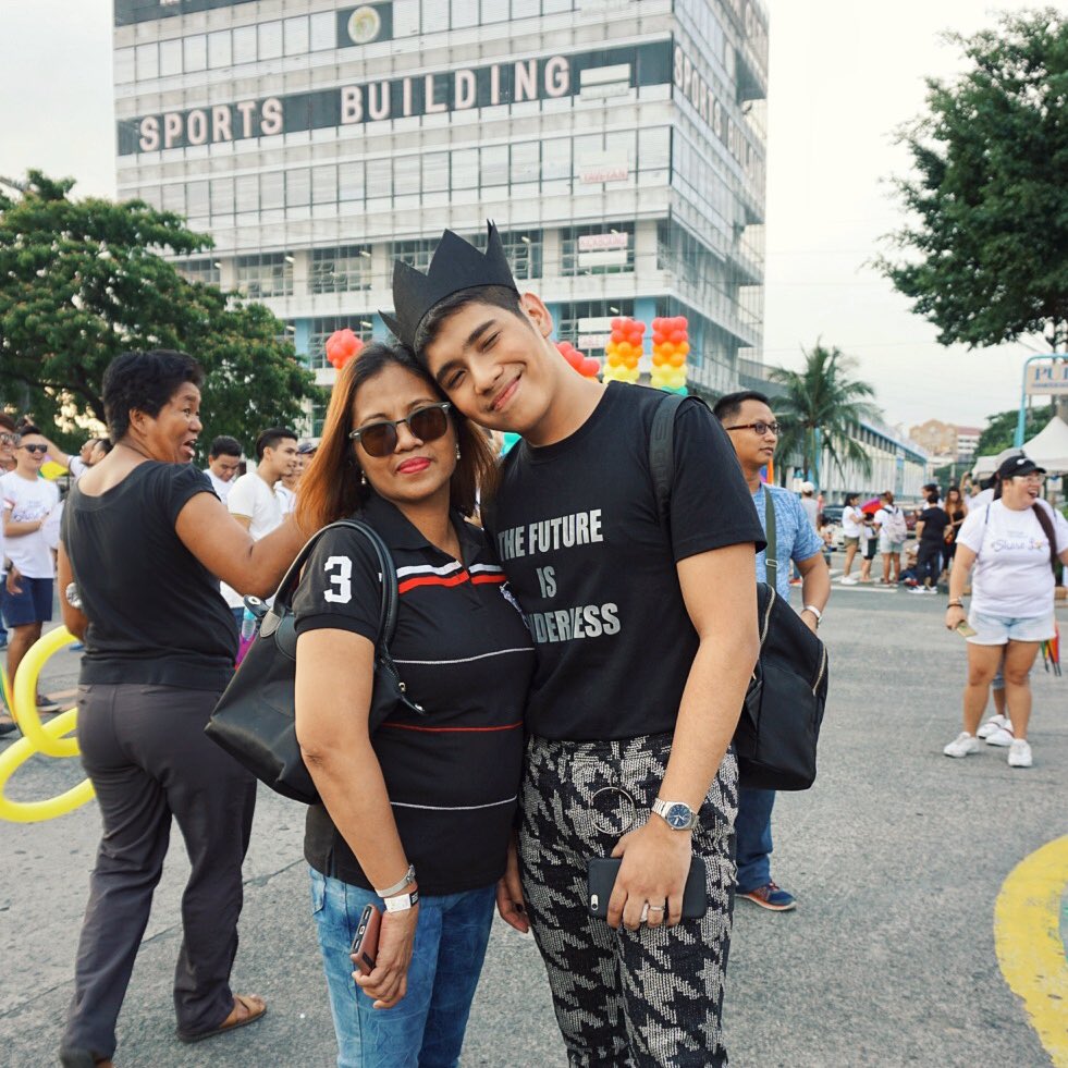 mom joins her gay son to pride march