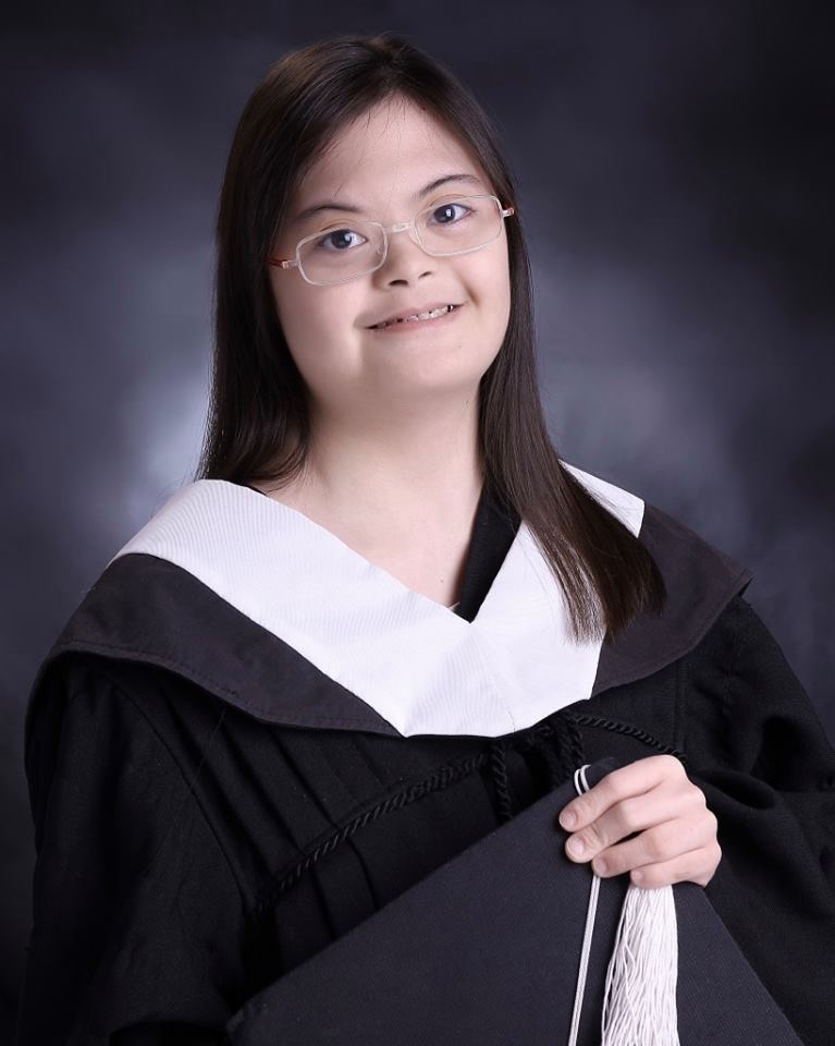 girl who has down syndrome is now a college graduate