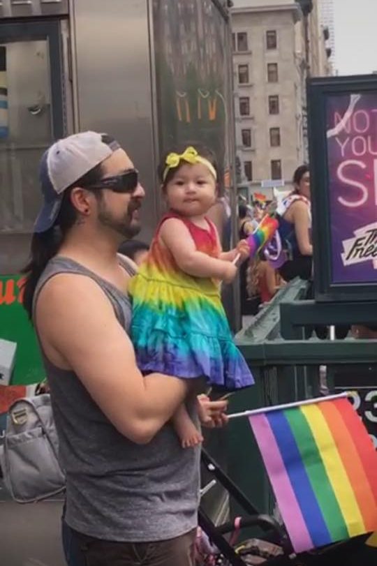 straight dad takes daughter to pride march