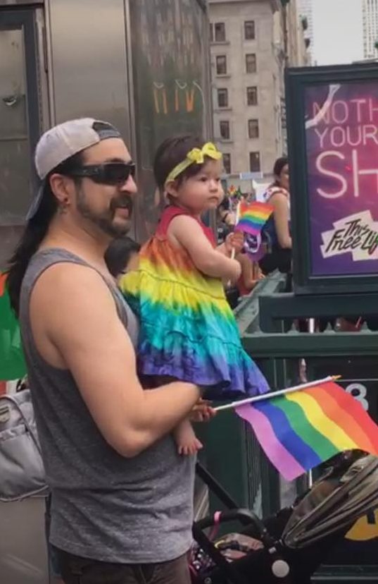 straight dad takes daughter to pride march